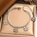 Pulseira dupla camada com osso de cobra de grama de quatro folhas, amuleto da sorte e design único para homens e mulheres, estilo e proteção. — foto 5