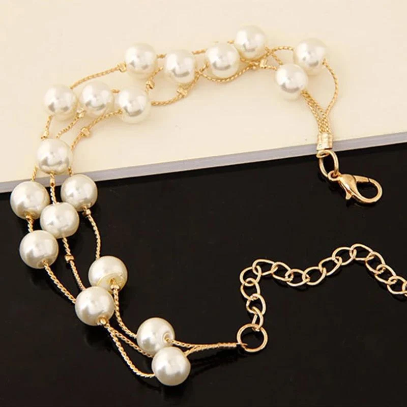 Conjunto coreano de brinco, pulseira e colar com pérolas multicamadas, ideal para um visual doce e elegante. — foto 5