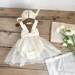 Saia com suspensório para bebês primavera verão, ideal para crianças, proporciona conforto e estilo para os dias quentes. — foto 5