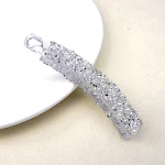 Diamond In The Debris 10cm bananenclip parel haar bun. Creëer eenvoudig elegante kapsels met deze modieuze en praktische haaraccessoire. — foto 8