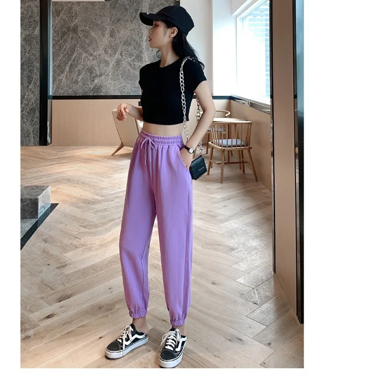 Candy-colored, high-waisted, thin women's pants designed to slim and flatter the figure, offering a stylish and comforta — photo 2