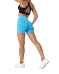 Naadloze elastische camouflage yoga shorts voor dames. Biedt comfort en bewegingsvrijheid tijdens je workouts. — foto 1