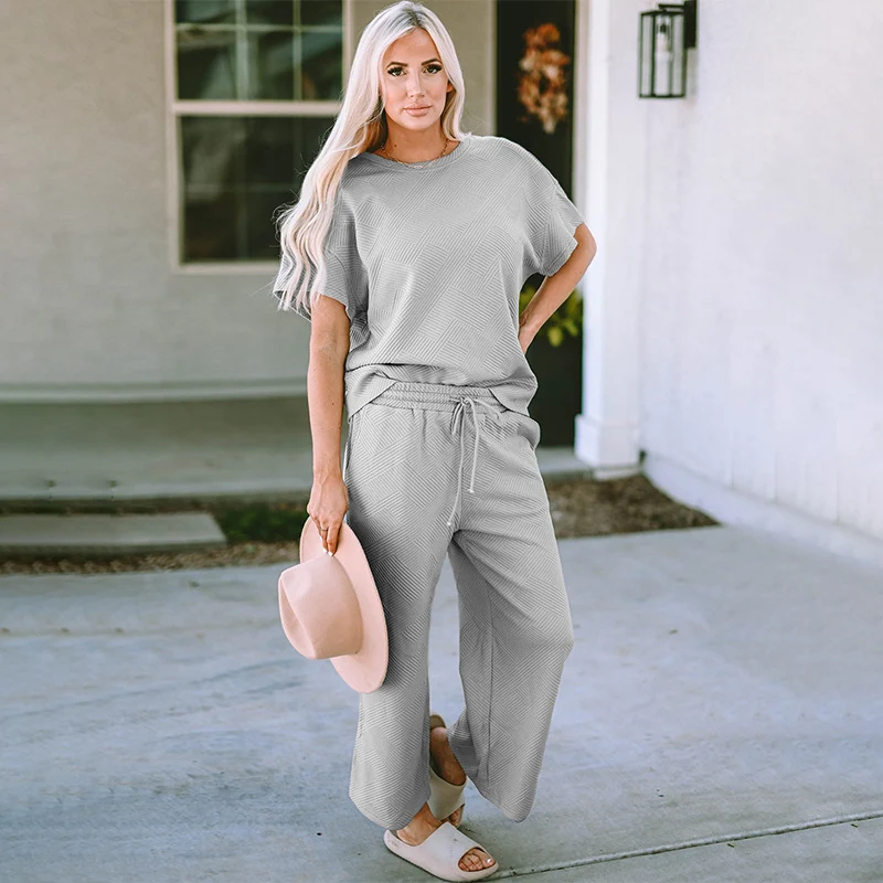 Conjunto de calças soltas e manga curta para mulheres. Conforto e estilo para o verão. Perfeito para looks casuais e elegantes. Frescor e leveza garantidos. — foto 18