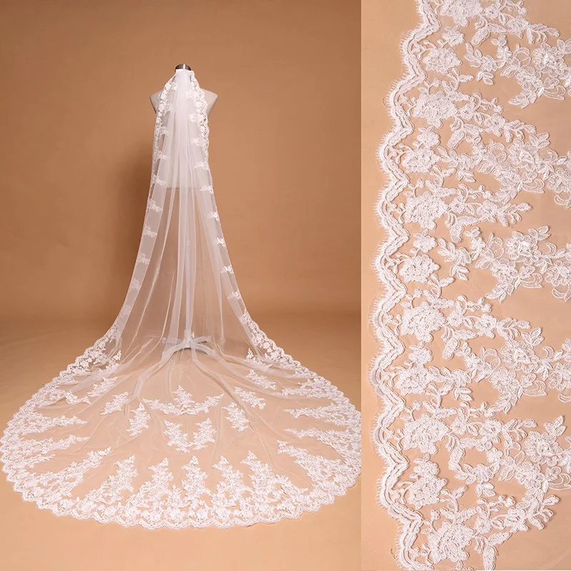 Velo lungo in pizzo per la sposa. Aggiungi un tocco romantico ed elegante al tuo abito da sposa e risplendi nel giorno del tuo matrimonio. — foto 5