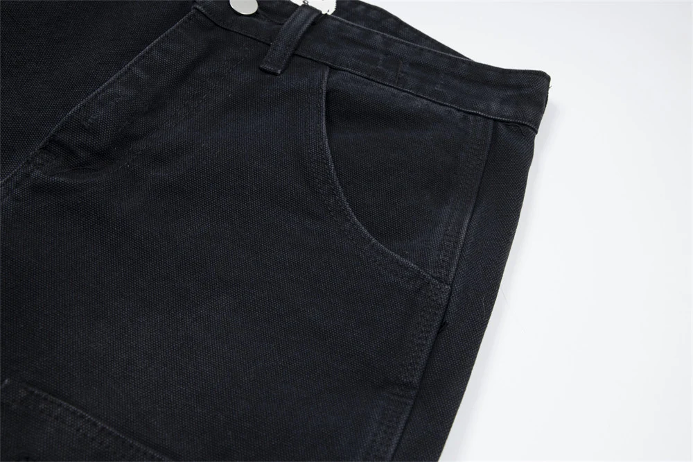 Heren denim shorts met wassing en gaten. Zomerse jeansshorts voor een casual look. Comfortabel en stijlvol voor warme dagen. — foto 16