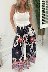 Calças femininas soltas estampadas com bolsos Conforto e estilo para o dia a dia. Design de pernas largas e tecido leve. Perfeitas para diversas ocasiões. — foto 6
