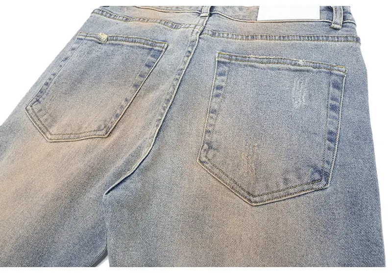 Title 12, Jeans pequeños, desgastados, con tinta y parche...
