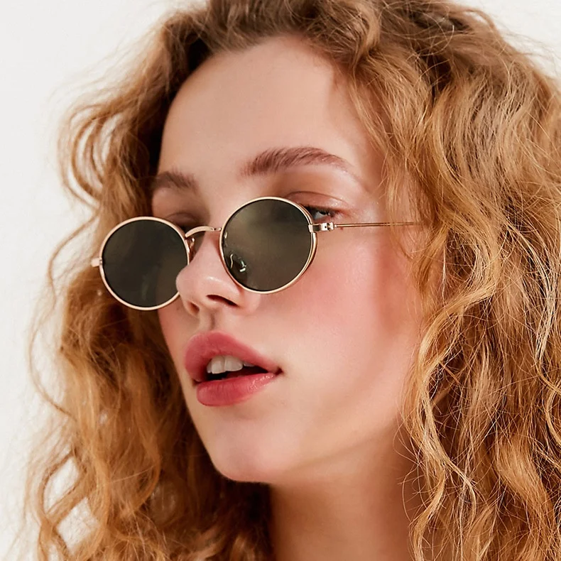 Óculos de sol oval retro, proteção solar e tendência. Estilo vintage para um visual único e proteção contra os raios solares com conforto. — foto 13