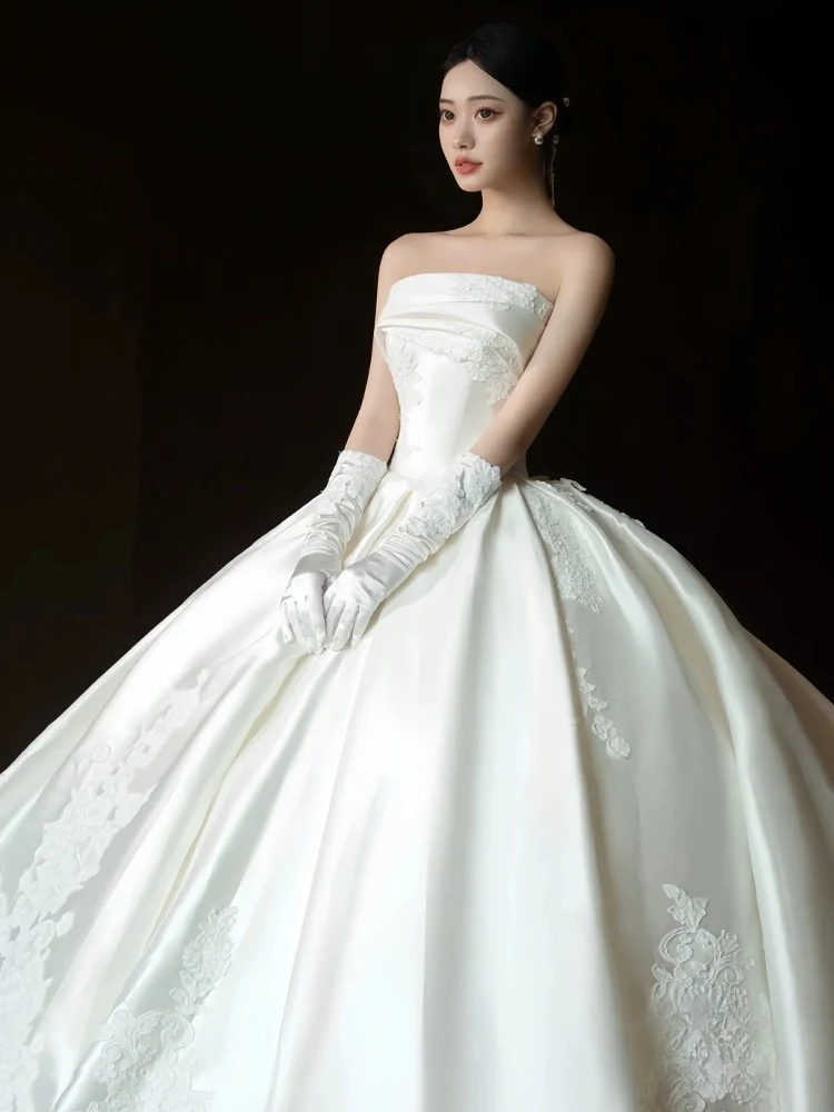 Title 3, Simple retro floor-length tube top dress with a...