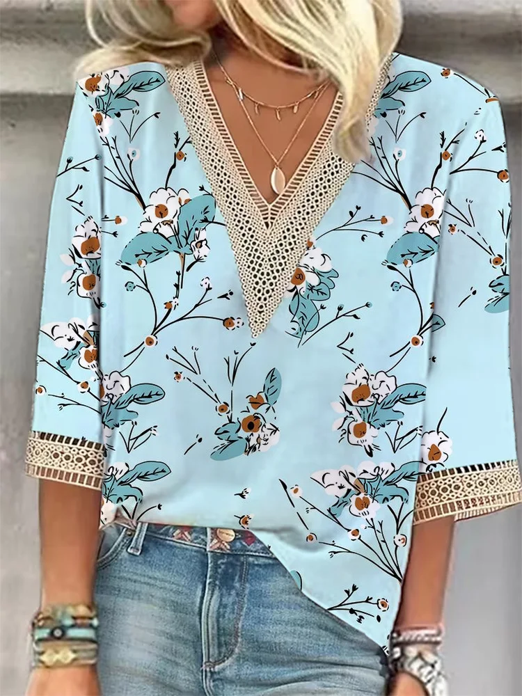 T-shirt da donna con scollo a V a manica media e nuova stampa floreale multicolore allentata — foto 13