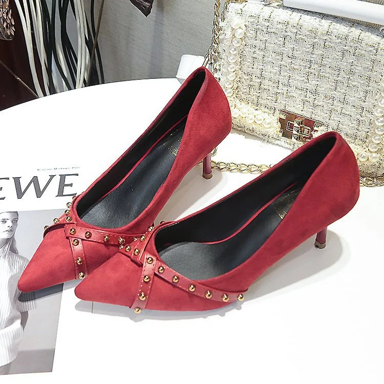 Pointed rivet high heels. Elevate your style with these stunning shoes. Confidently step out in these fashionable heels. — photo 5