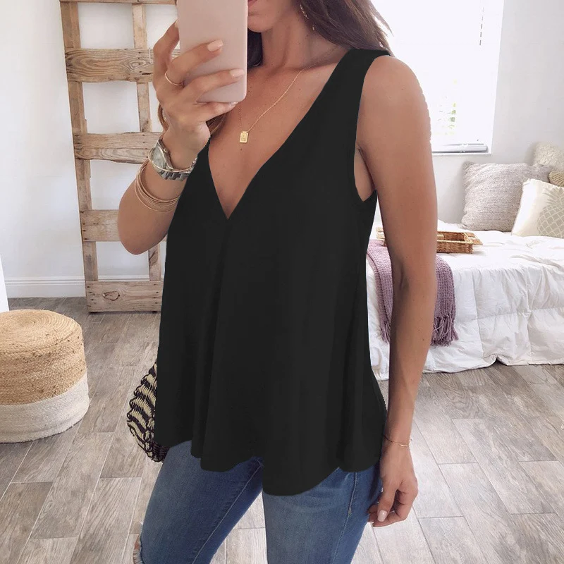 Deep V-shaped loose solid color sleeveless t-shirt, perfect for a casual and comfortable summer look. A versatile, styli — photo 5