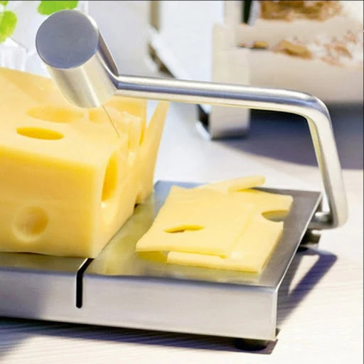 Title 4, Cheese slicer, butter spreader, and grater comb...
