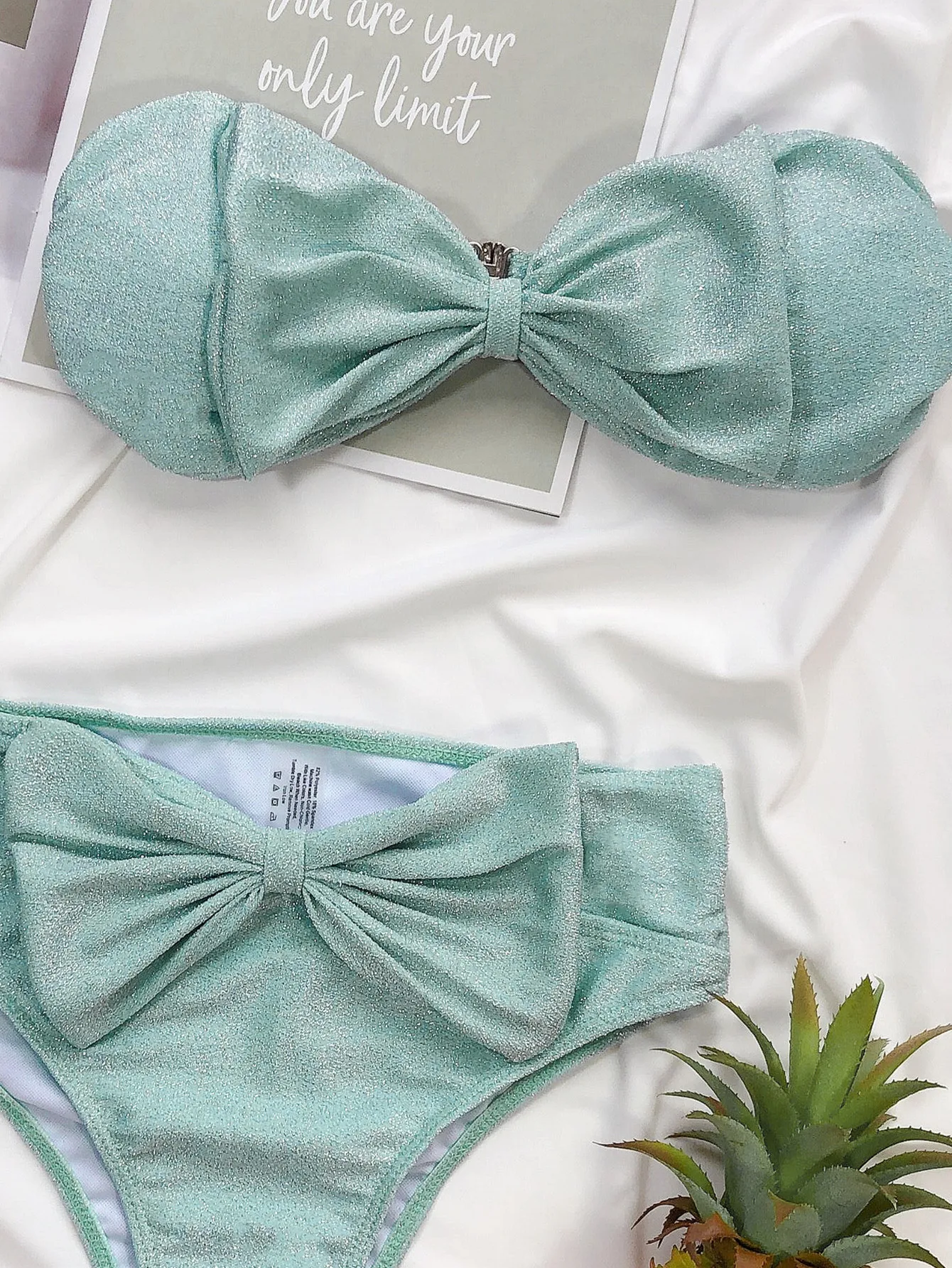 Title 10, Split bright silk bikini perfect for sunbathing...