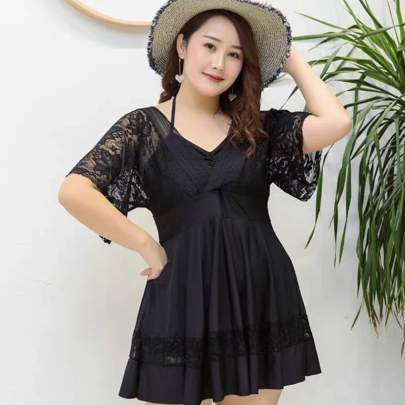 Title 4, Conservative split skirt swimsuit covering bell...