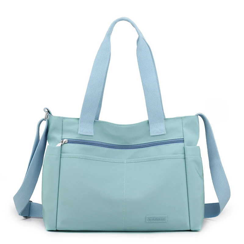 Bolsa de ombro feminina casual em nylon, grande capacidade, ideal para o dia a dia. Confortável, espaçosa e estilosa para carregar tudo o que precisa. — foto 2