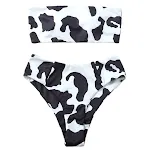 Costume da bagno a pois, con abbraccio al petto e spacco sulla spiaggia. Goditi il sole con stile e comfort, perfetto per l'estate. — foto 1