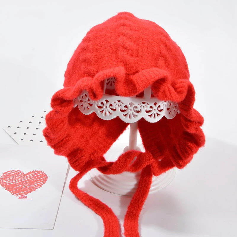 Title 11, Gorro de lana tejido con protección para las or...