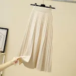 Mid-length pleated skirt, perfect for versatile and elegant outfits. Comfortable and stylish, suitable for any occasion. — photo 7