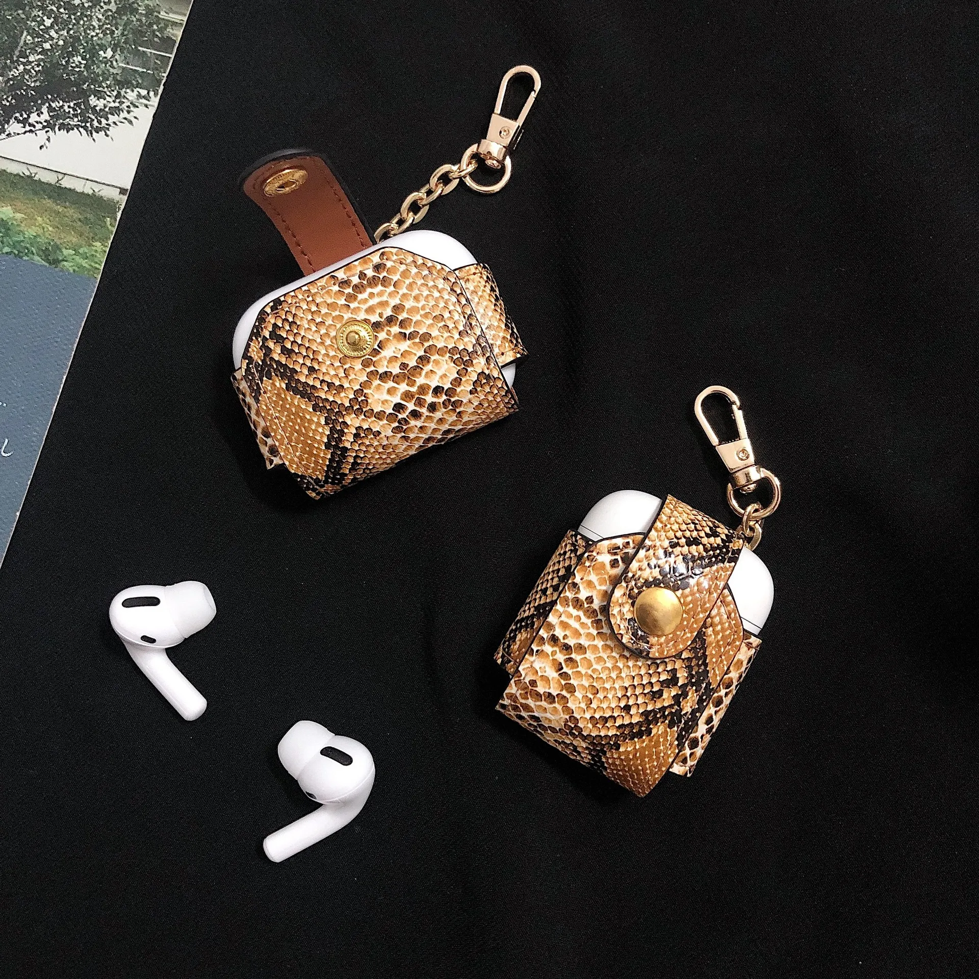 Title 2, Snakeskin pattern AirPods protective sleeve com...