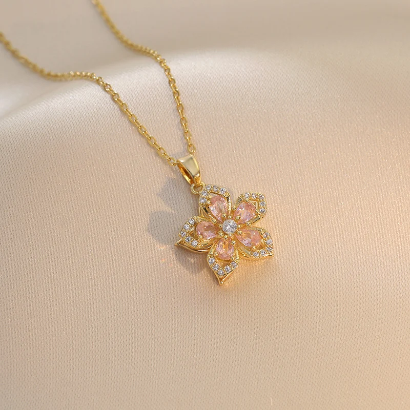 Colar feminino de flor Bauhinia com zircônia rotativa, um acessório elegante e giratório que adiciona brilho e sofisticação ao seu visual. — foto 11