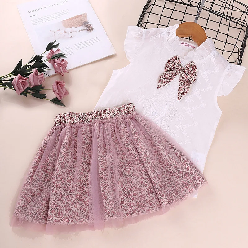 Kinderkleidung, Frühlings- und Sommer-Trend für Mädchen, ärmelloses Oberteil mit Schleife und Mesh-Rock, heißer Exportartikel. — foto 4