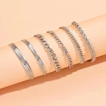 Pulseira em camadas com corrente e lâminas de metal simples, um acessório elegante e moderno para complementar seu visual e adicionar charme. — foto 1