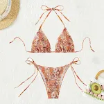 Biquíni sexy com amarração fragmentada, perfeito para realçar sua beleza na praia ou piscina, proporcionando um visual sensual e atraente. — foto 1
