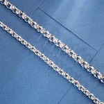 Pulseira masculina de aço titânio com superfície de corte múltiplo e corrente. Design moderno, resistente e ideal para uso diário. — foto 7