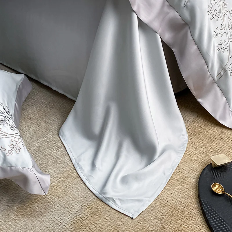 Jogo de lençóis de cama de fibra de lyocell bordado premium, quatro peças, para uma noite de sono luxuosa e suave. Durma com conforto e estilo. — foto 1