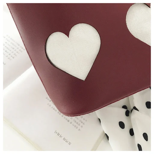 Title 12, All-match hollow small peach heart bucket bag. ...