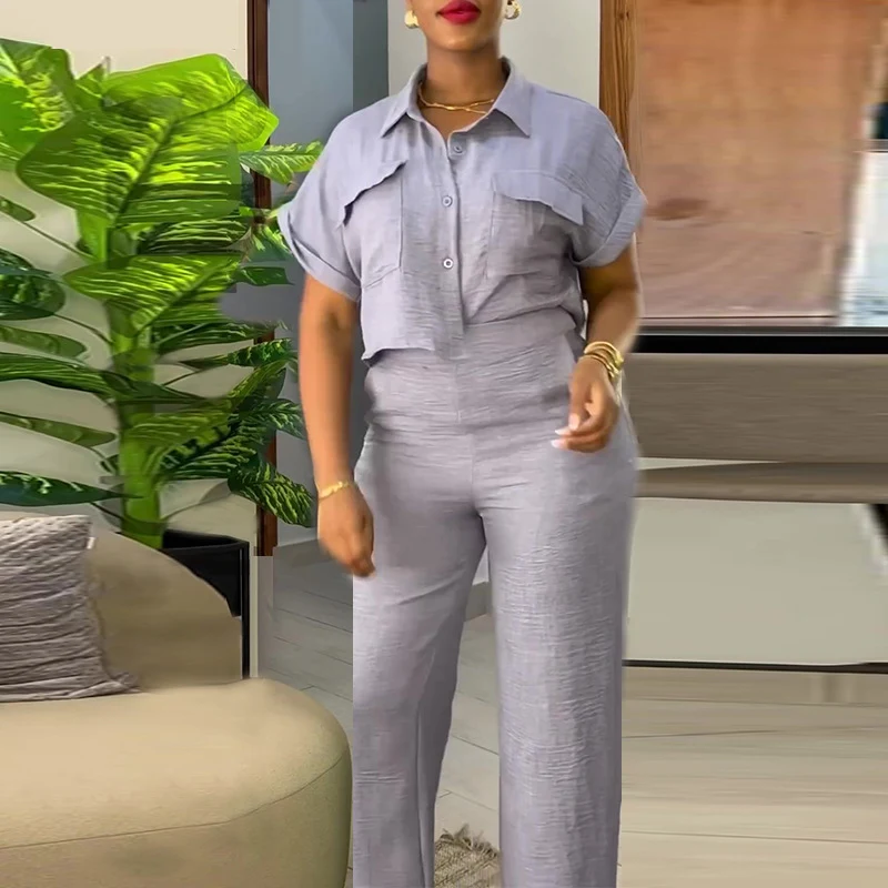 Terno de moda com camisa e calças de perna larga. Elegância e conforto em uma única peça, perfeito para diversas ocasiões. — foto 21