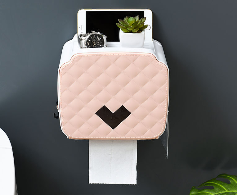 Wall-mounted tissue holder for convenient access and space-saving design. Keeps tissues within reach and adds a modern t — photo 1