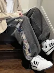 Jeans de hombre High Street Bear Stitching, pantalones sueltos para otoño, estilo casual y holgado para parejas. — foto 1