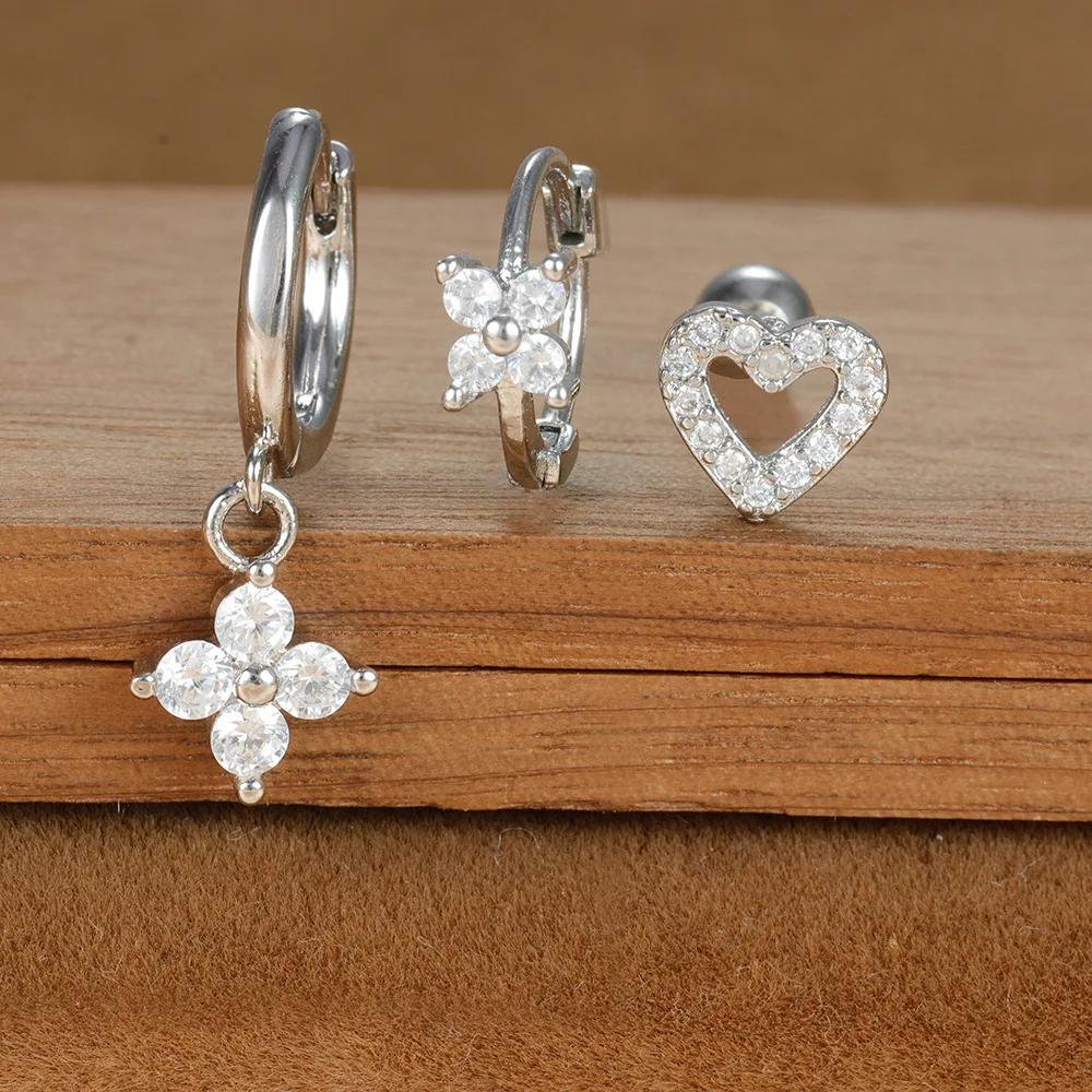 Brincos de orelha geométricos fashion com zircônia para mulheres. Conjunto charmoso e delicado, ideal para looks femininos e sofisticados, com brilho elegante. — foto 14