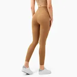 Skin-friendly nude high-waisted peach hip-lifting yoga pants for women. Fitness tights designed for comfort and performa — photo 19