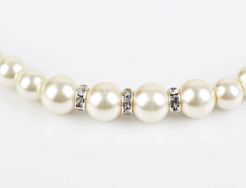 Weißes Perlenkette-Ohrringe-Armband-Set für Damen. Perfekt für Hochzeiten, besondere Anlässe und um Ihren Look zu veredeln. — foto 1