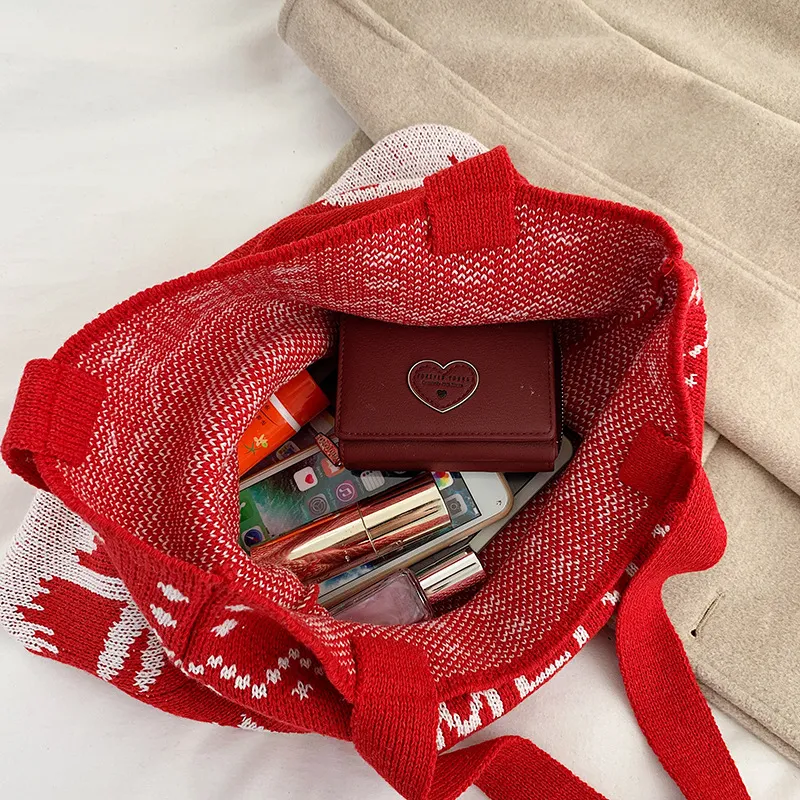 Bolsas de mão de lã tricotadas à mão, charmosas e aconchegantes. Leve seus itens essenciais com elegância e toque artesanal único. — foto 1