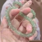 Pulseira Nó de Bambu Jade Gelo Fresco Simples Temperamento Elegância Refrescante para o seu pulso. Sinta o frescor e estilo com esta joia única. — foto 5