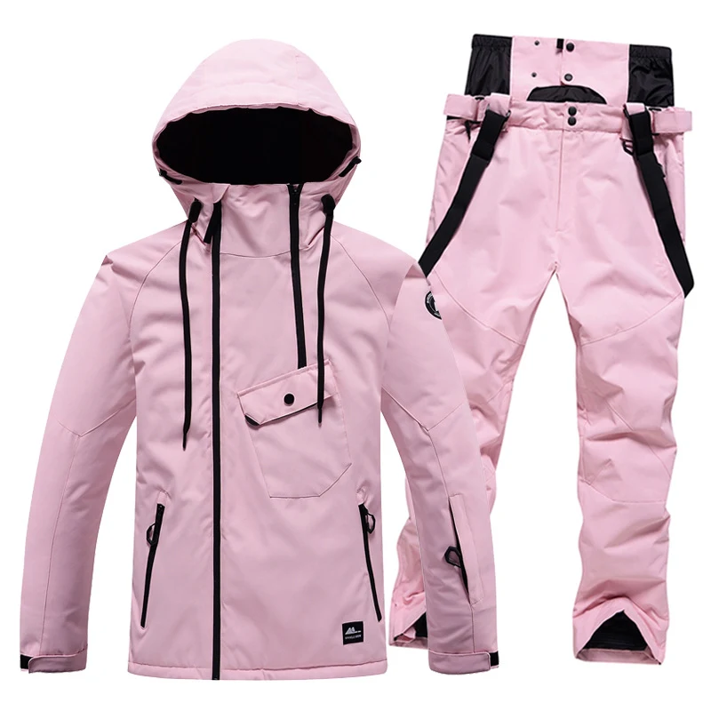 Tuta da sci tinta unita per uomo e donna. Protezione impermeabile e calore sulla neve. Perfetta per sciare e fare snowboard. Comfort e stile in montagna. — foto 13