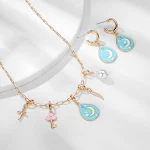 Colar e brincos femininos com pingente de lua, esmalte, estrelas e paetês. Um conjunto charmoso e brilhante para mulheres. — foto 5