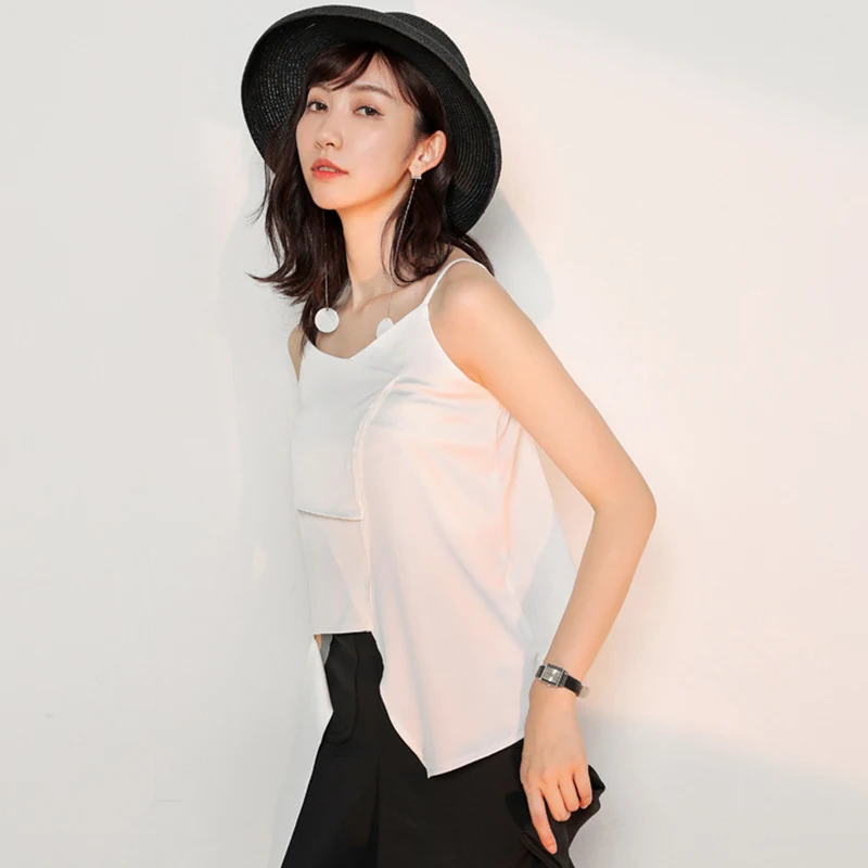 Slim and irregular fashion top for a stylish and modern look. Unique and flattering design, perfect for various occasion — photo 3