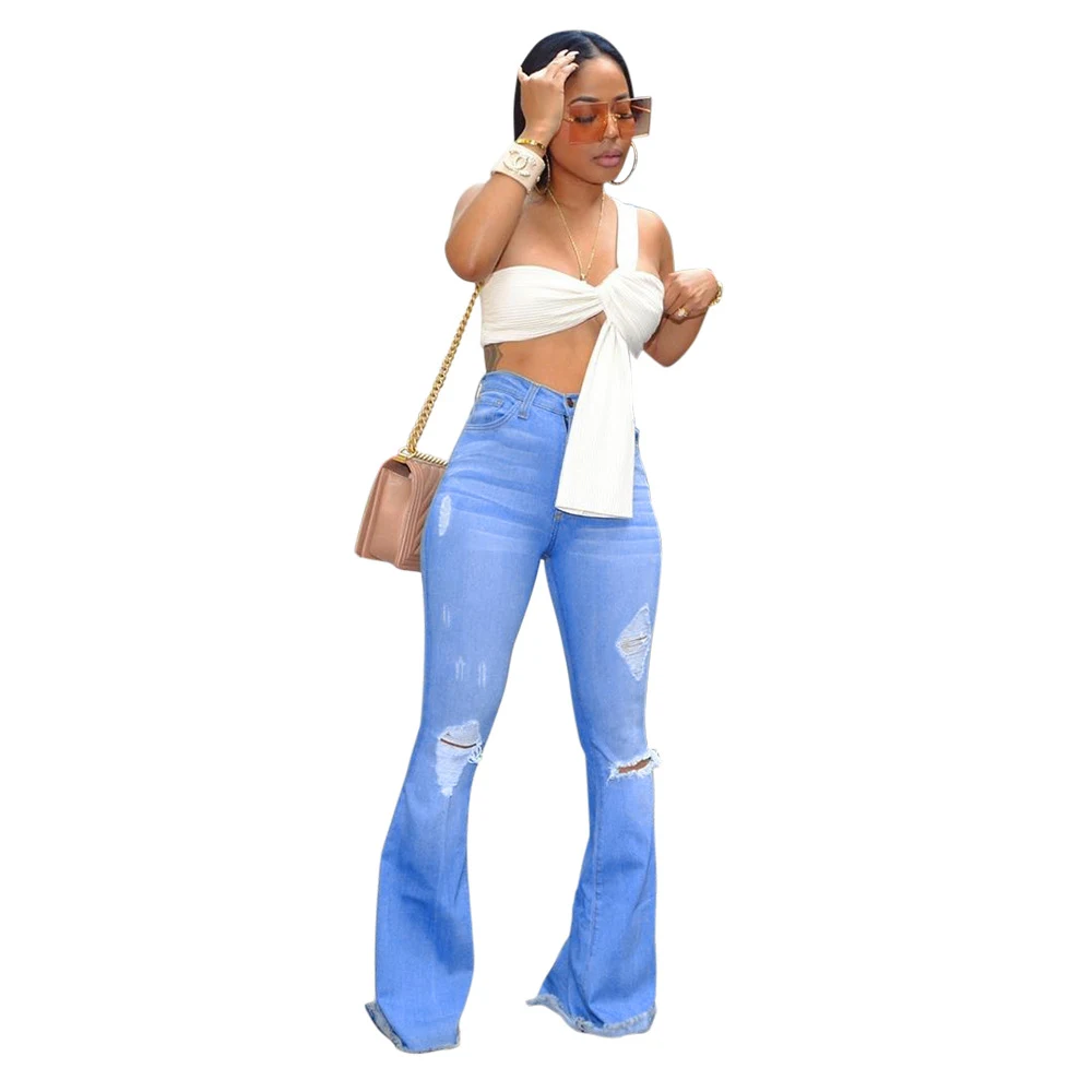 Jeans de fio soprado e rasgados para um visual despojado e moderno. Conforto e estilo se unem, ideais para qualquer momento. — foto 2