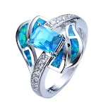 Anel de noivado feminino em opalina azul com diamantes. Celebre seu amor com este anel elegante e atemporal. Um presente perfeito. — foto 2