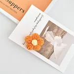 Orange flower brooch