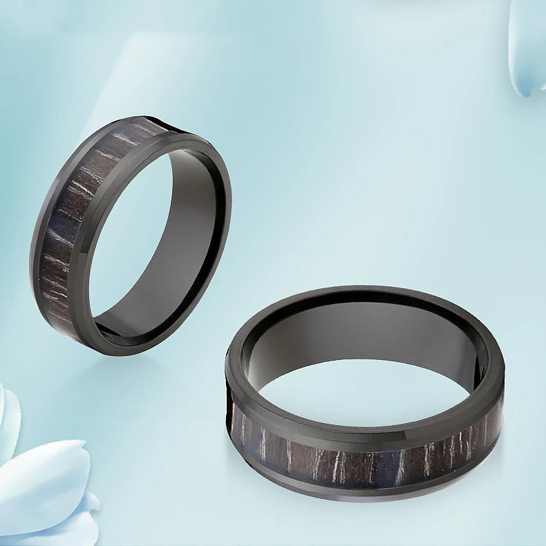 Anel para casais em aço inoxidável simples e moderno com ébano. Uma joia elegante, perfeita para simbolizar o amor. — foto 3