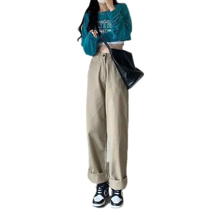 Calça jeans de cintura alta e perna larga, estilo retro, solta e reta, com efeito mopping, para um visual moderno e despojado. — foto 2