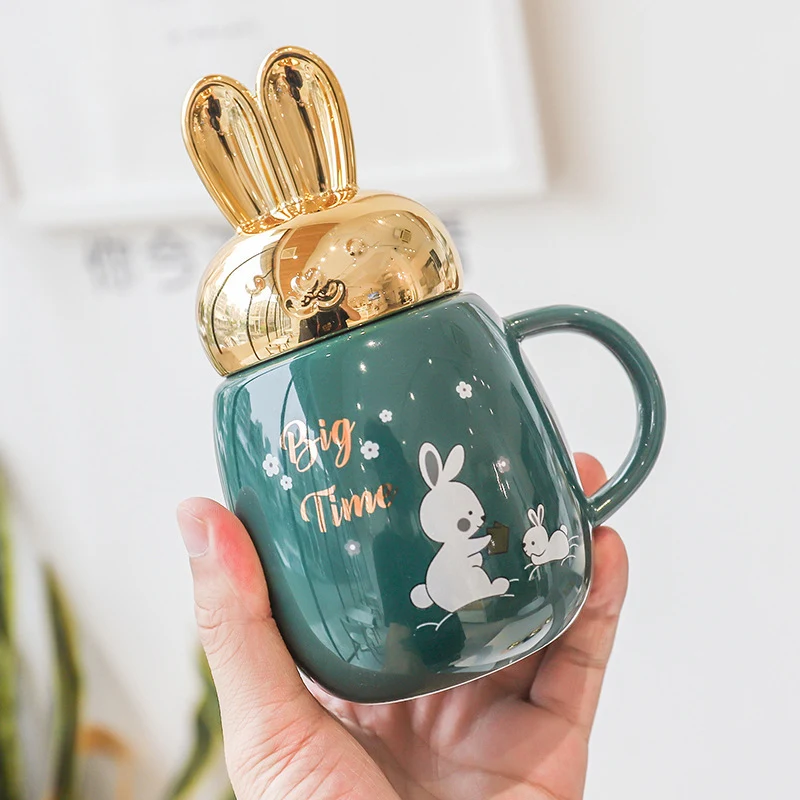 Title 7, Taza de cerámica con orejas de conejo de dibujo...