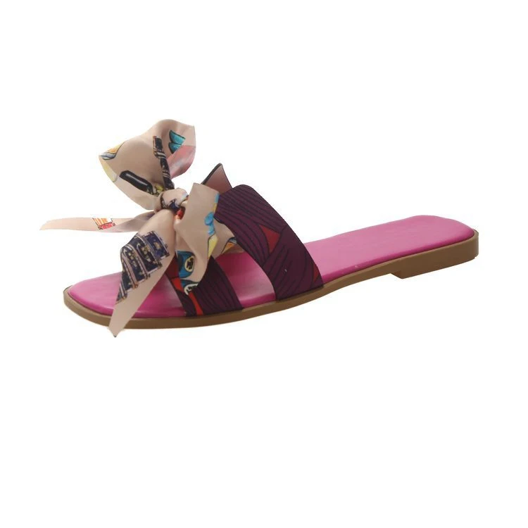 Flat slippers with a colorful ribbon bow, offering comfortable style for everyday wear. Perfect for summer, lightweight — photo 3
