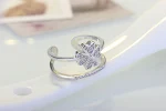 Anel feminino de grama de flor de quatro folhas com diamante, um símbolo de sorte e beleza, perfeito para presentear. — foto 9